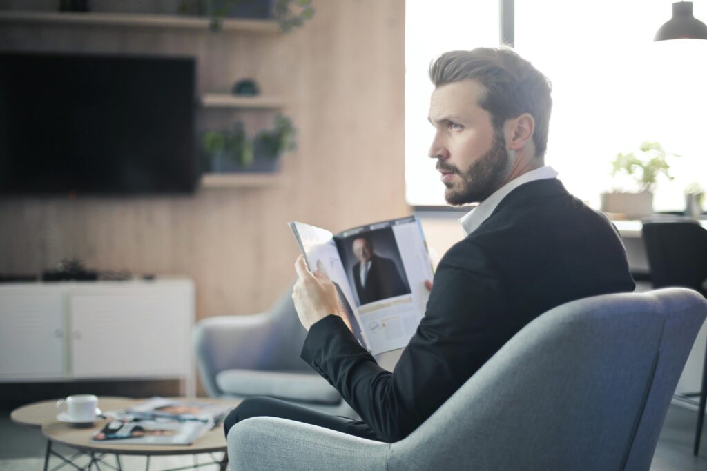 man with magazine